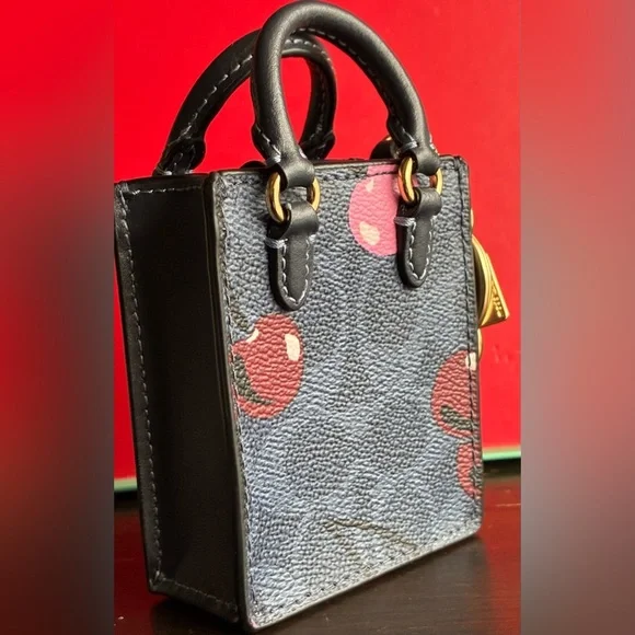 Coach Navy and Burgundy Cherry Print Key Holder - Picture 10 of 15